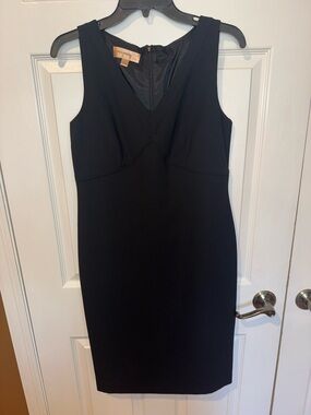 Classic Black Sleeveless Sheath Dress